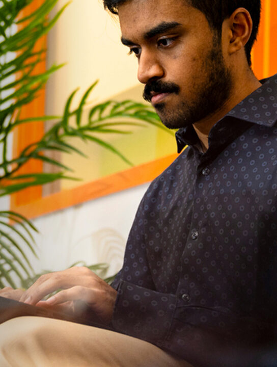 Northeastern student collaborating with industry partner on real-world project